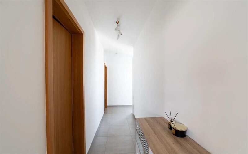 Stačí se nastěhovat! Moderní 2+kk s balkonem 9 m², garáží a sklepem v projektu Vivus Argentinská